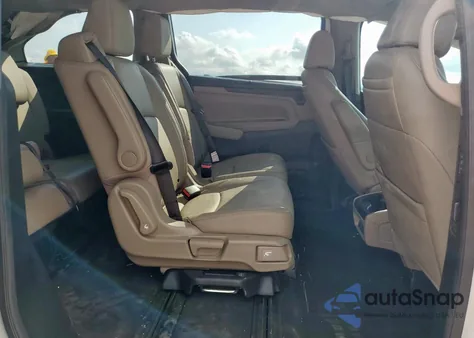 2023 Honda Odyssey Touring from USA, damaged, VIN 5FNRL6H86PB037111